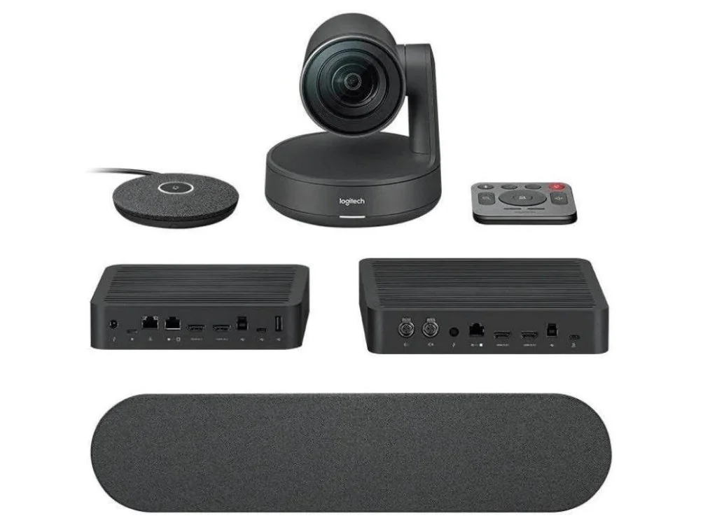Logitech Rally Plus system: PTZ camera, mic pod, remote, display and table hubs, speaker
